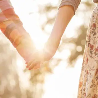happy couple holding hands