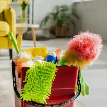 living room with cleaning supplies
